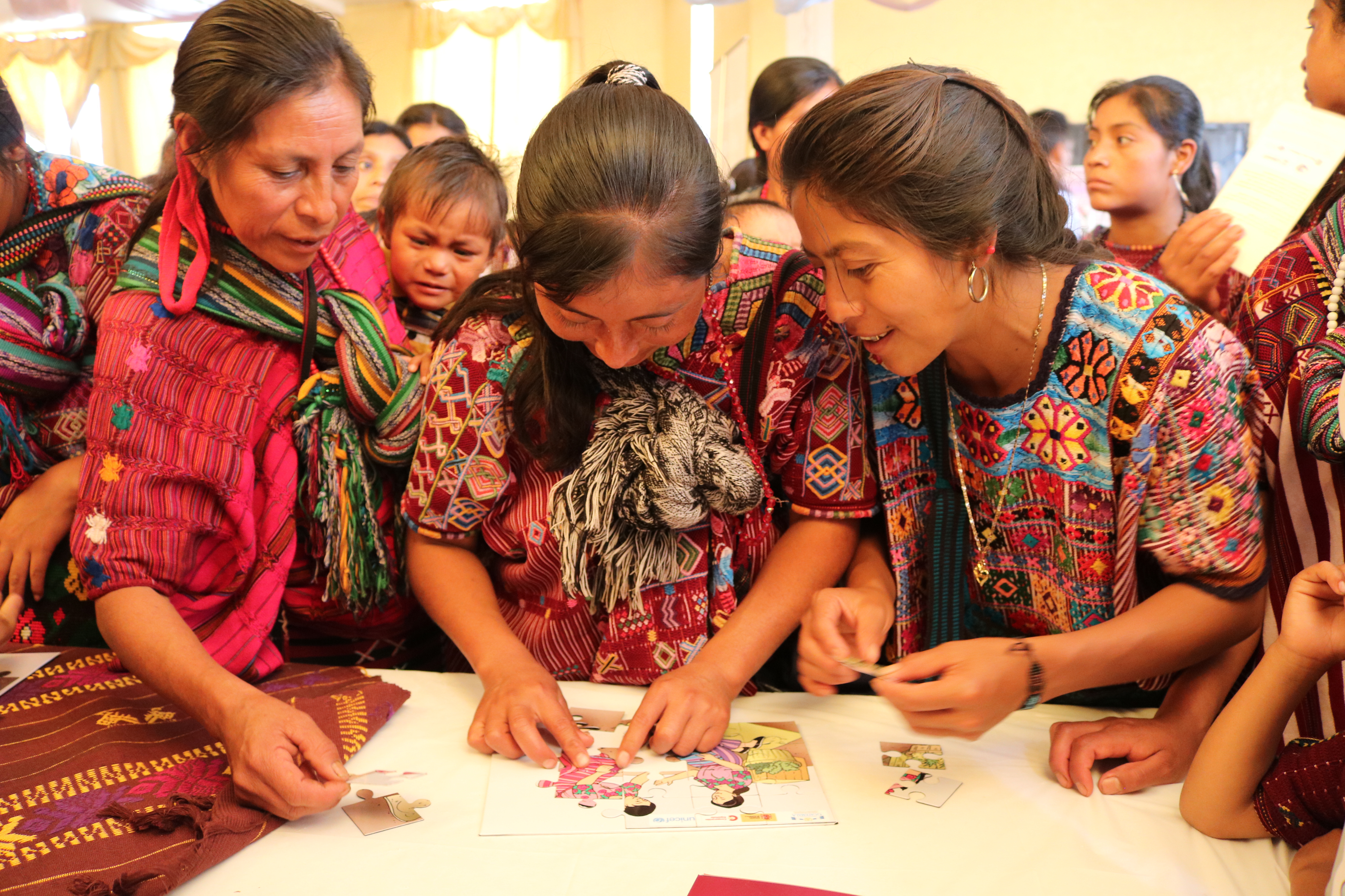 Group learning activity at a community table